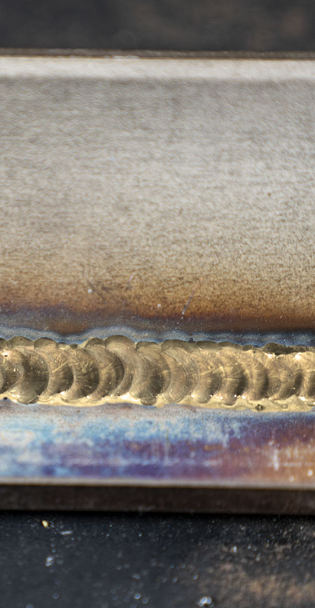 Example of a straw/yellow coloured TIG weld